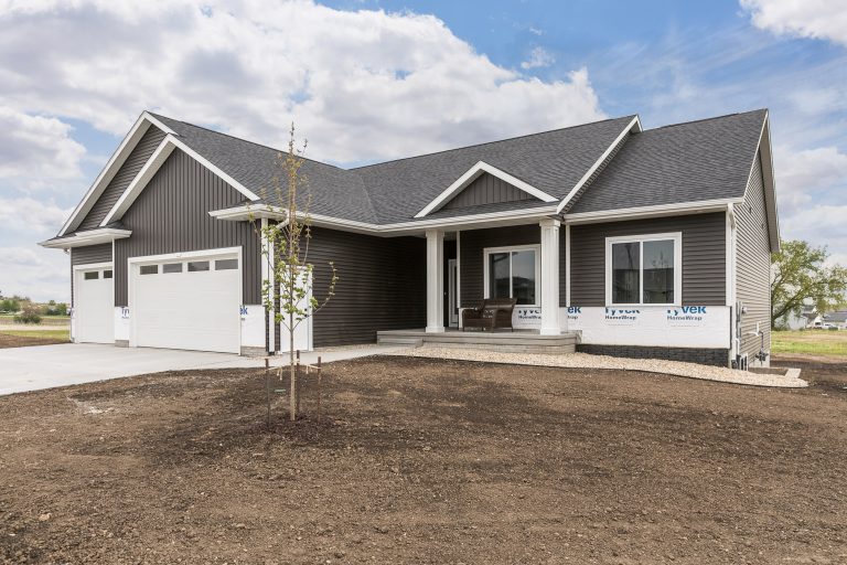 front of home with tree in yard