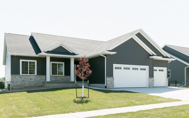 front of home with tree in yard