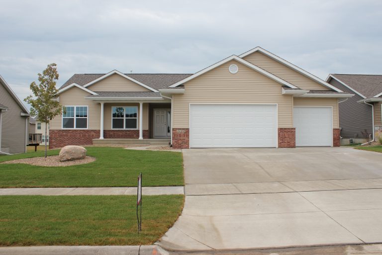 front of home with tree in yard