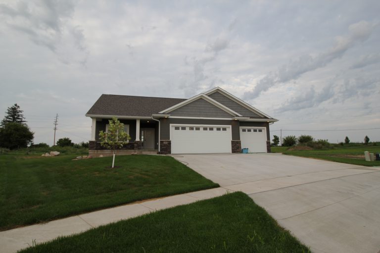 front of home with tree in yard