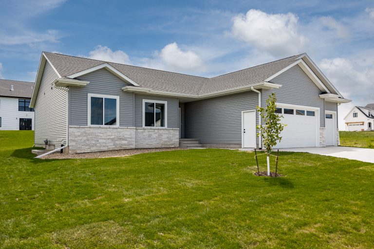 front of home with tree in yard