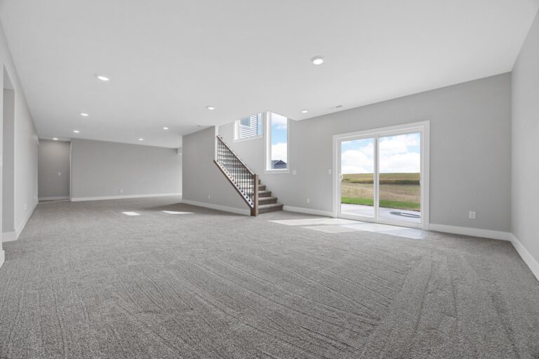 finished basement with sliding walkout door