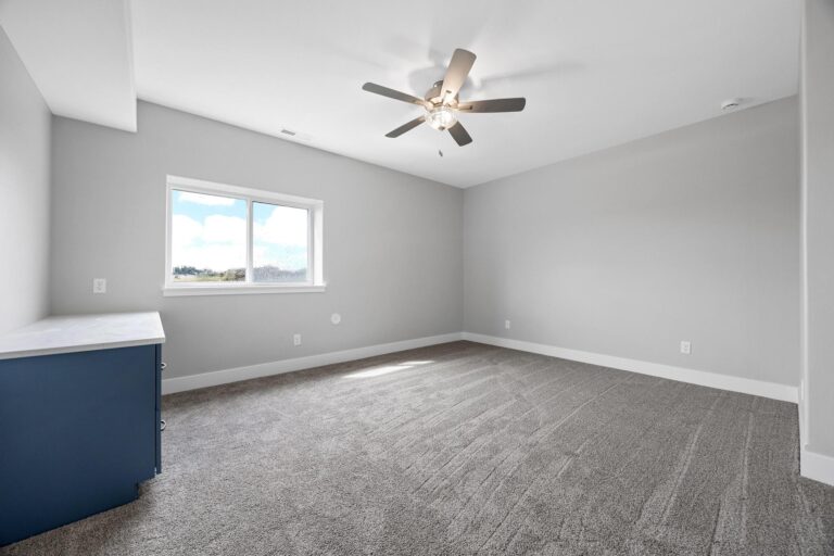 office with desk and ceiling fan